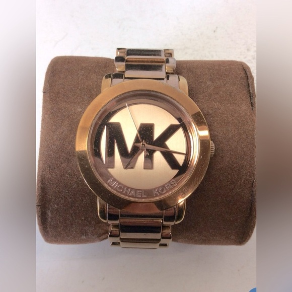 Michael Kors women’s Rose Gold Watch, includes extra link; original tags, & box